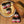 Baked goods with jars of ground spices on a wooden surface