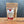 A brown resealable pouch of Turkish Spice, Worldly Wow! Bold Türkiye Blend stands on a wooden surface. The front label lists ingredients, describes the blend, and features contact details at the bottom.