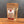 A stand-up kraft paper pouch of Tradition Spice Company Best Bruschetta Italian Spicing Mix, displayed on a wooden surface against a dark gray background.