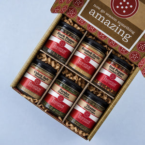 Soup Toppers Savory Set gift box filled with assorted Tradition Spice Company seasoning jars.