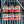 Six jars of Tradition Spice Company spices on a metal surface