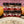 Jars of Tradition Spice Company spices with a dish of pasta in the foreground.